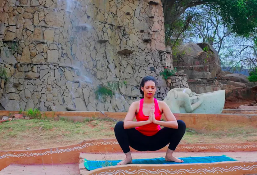 7 Yoga Poses To Induce Labor, Because You're Ready To "Om" This Baby Out