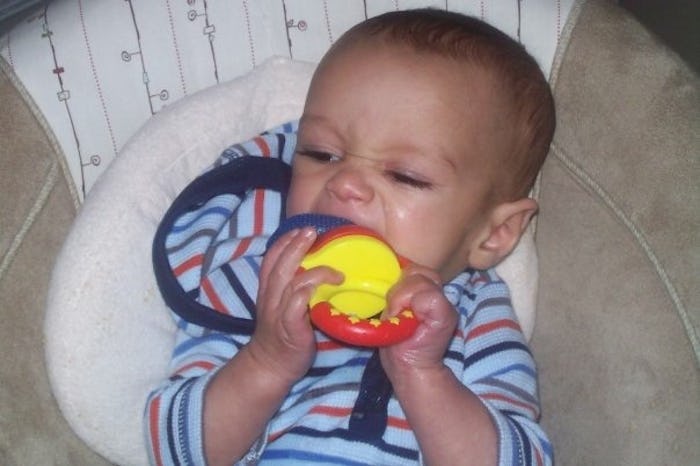 Kid using a teething toy