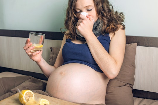 pregnant woman sick in bed