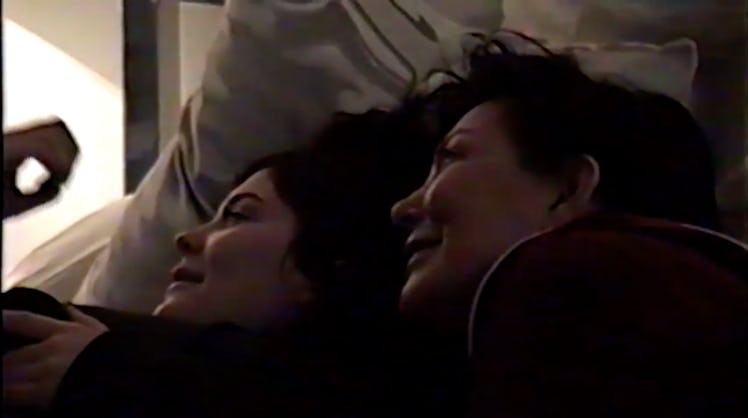 Kylie Jenner and Kris Jenner lying in bed and watching something in an intimate atmosphere