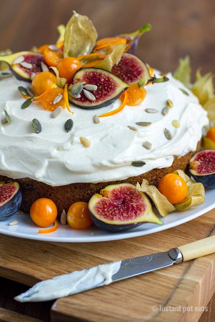 Instant Pot nut-free fig and apricot carrot cake served with a lot of fruit and seeds 