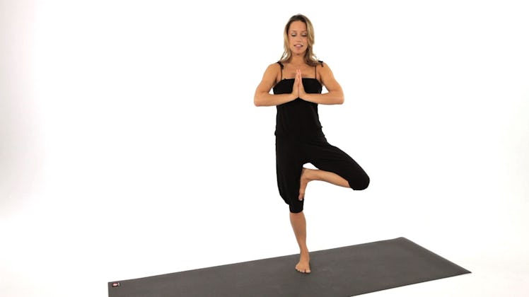 Tree pose is a great balancing yoga pose for the spring equinox.