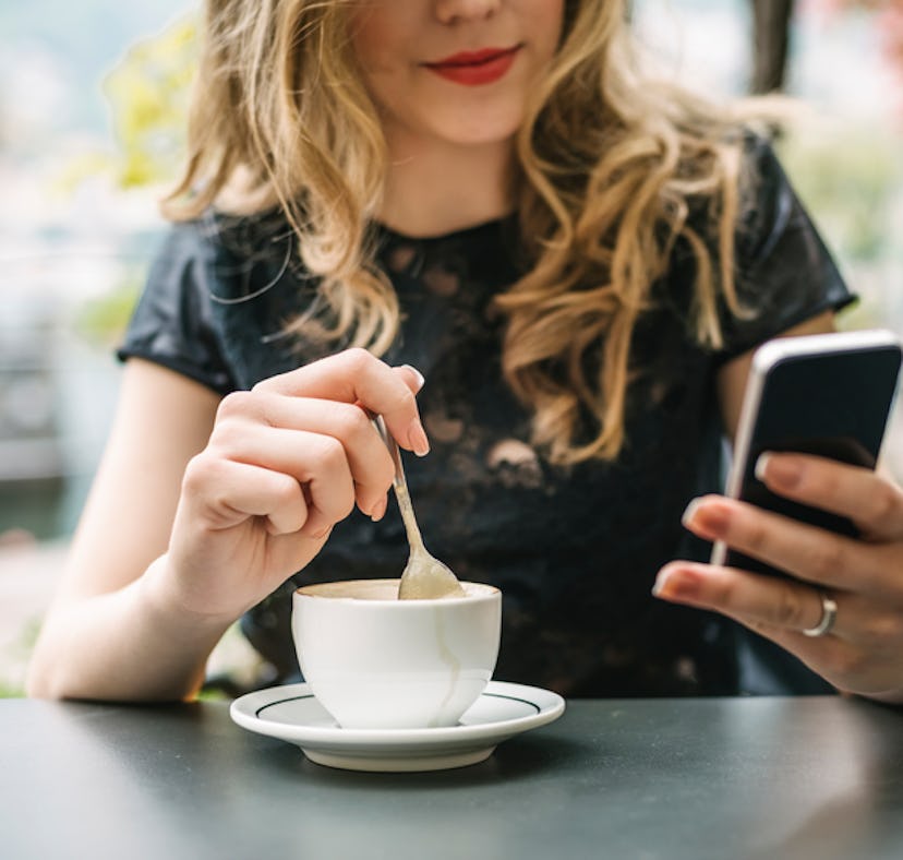 A woman decides which picture to send to her crush.