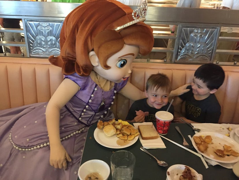 Princess Sophia says hello during a Character meal at the park.