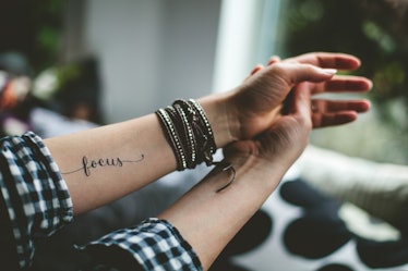 9 One Word Tattoos That Are So Simplistic & Beautiful