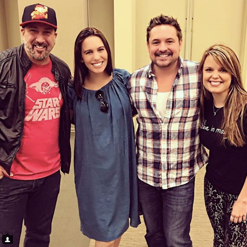 Christy Carlson Romano posing for a photo with Joey Fatone, Will Friedle, and Kimberly J. Brown