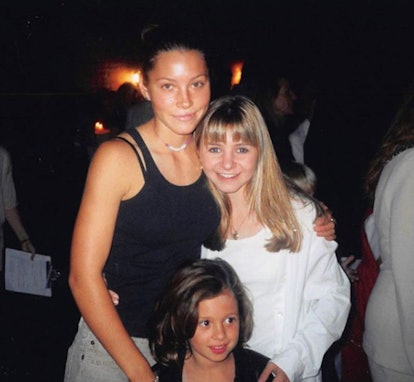 Beverley Mitchell posing for a photo with Jessica Biel and Mackenzie Rosman