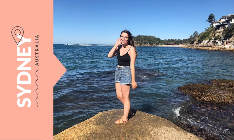 Sarah Fielding posing on pier in Sydney, Australia.