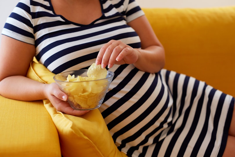 Image result for pregnant woman eating chips