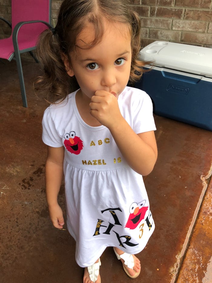 A little girl sucking her thumb