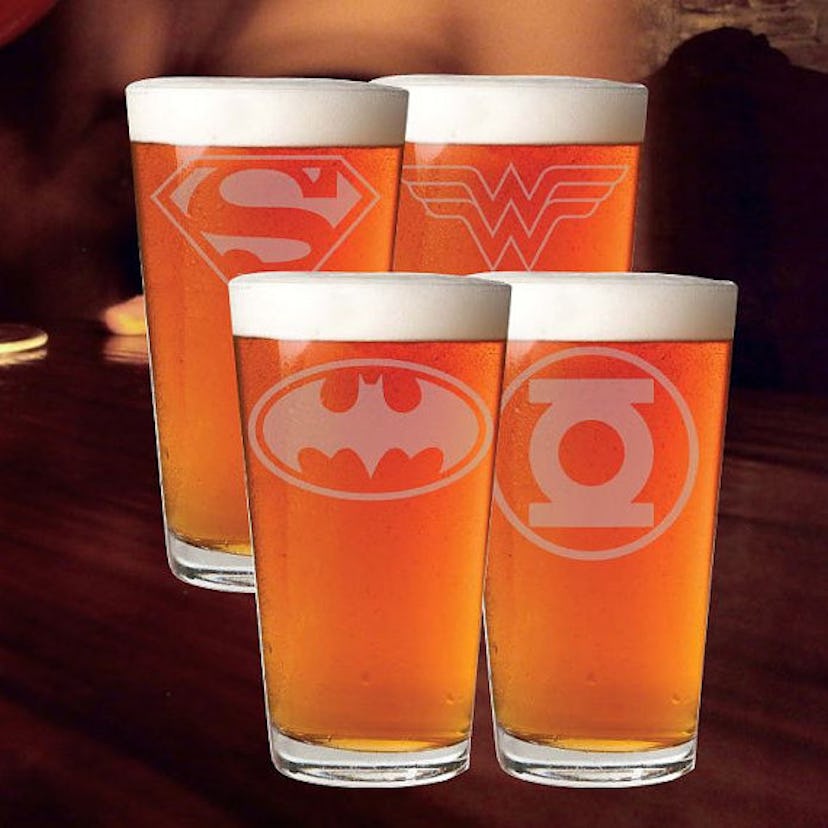Four different superhero pint glasses