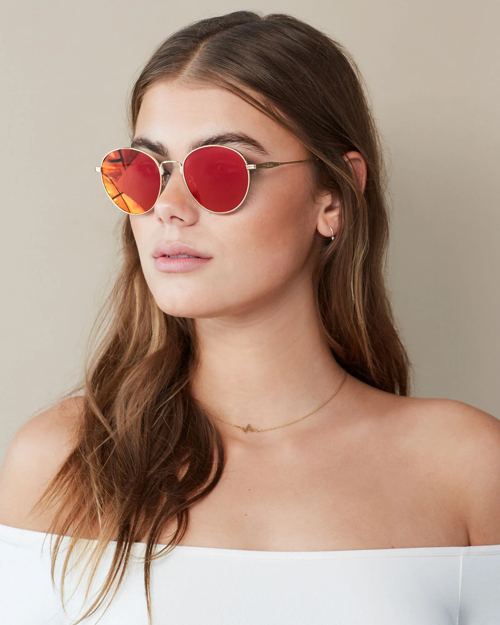 Why Orange Sunglasses Are Going To Be Everywhere This Summer