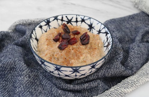 Sweet rice pudding served in a bowl on top of a blanket