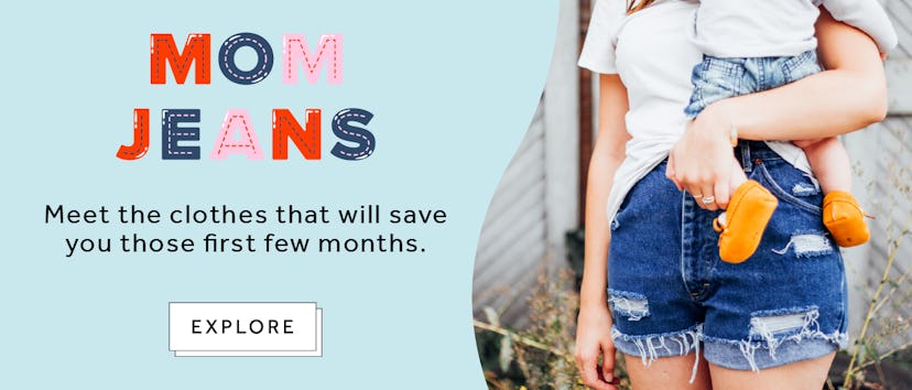 Mom jeans logo next to woman in jeans holding her baby