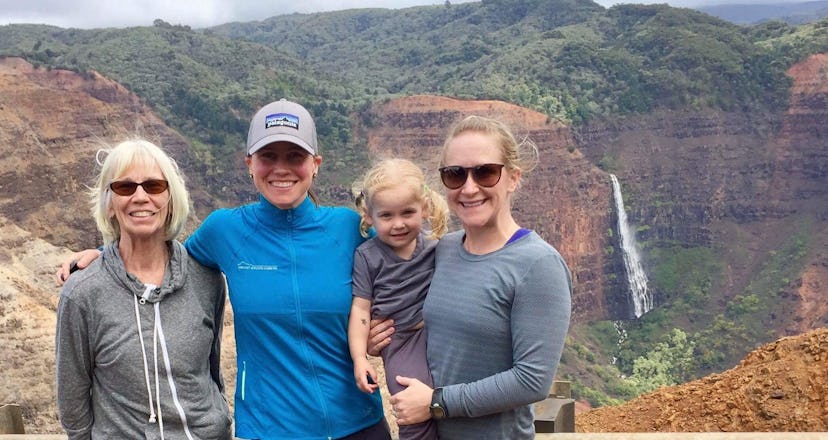 Three women and a small girls hiking in the nature