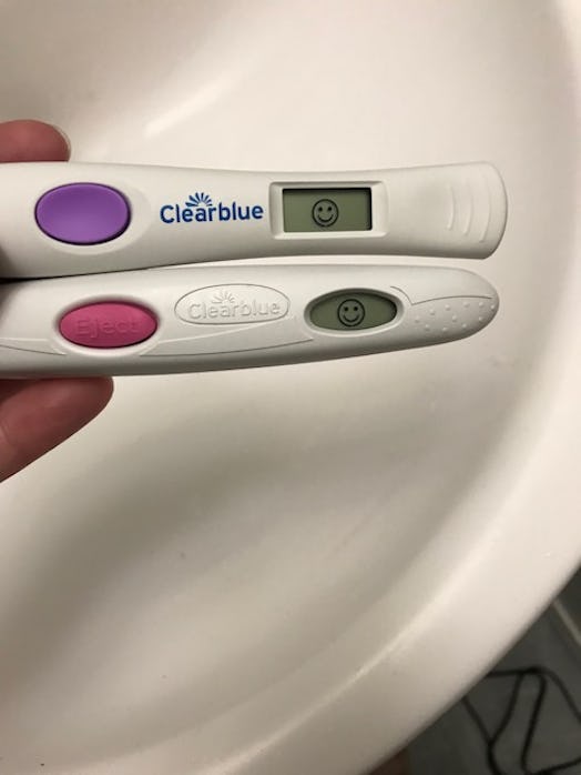 Two pregnancy tests both indicate that they're positive. 