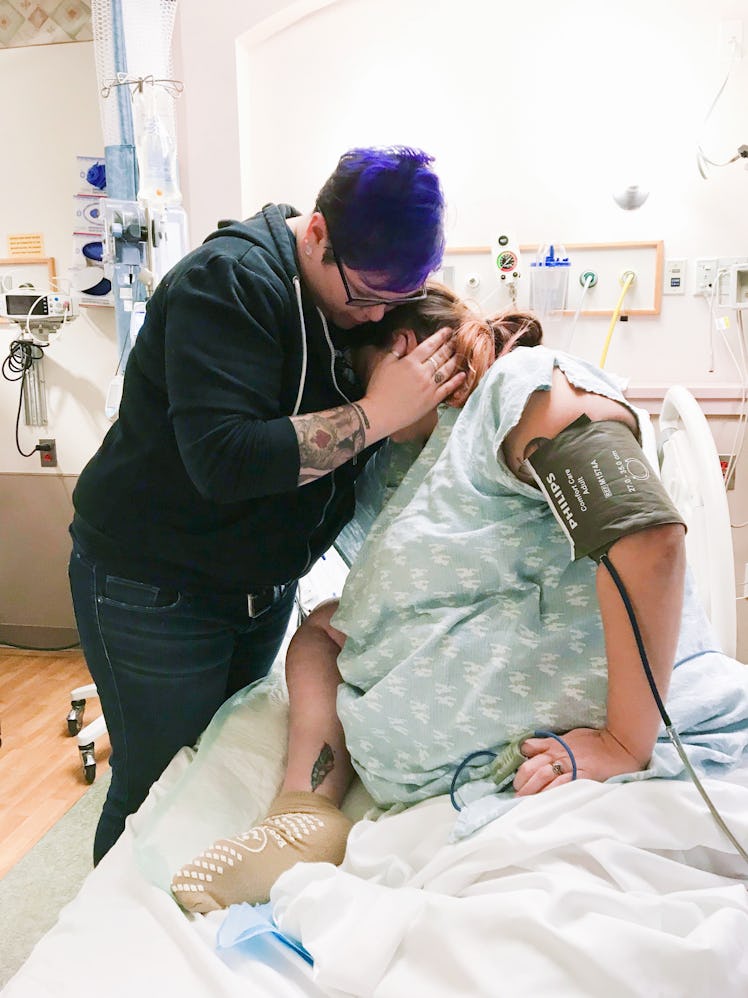 Partners hugging each other after the lady almost died while giving the birth
