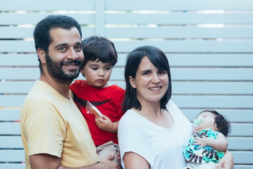 Denise Gomes with her husband and her two children 