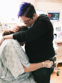 A guy comforting his wife after she almost passed away while giving the birth
