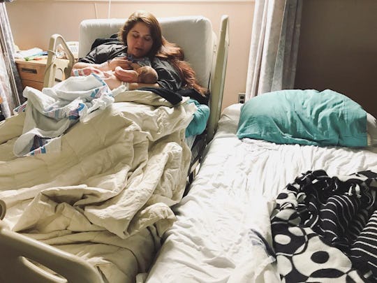Dese'Rae L Stage lying in a hospital bed with her newborn baby