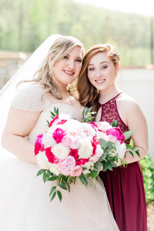 Jenée Justice Tate in her wedding dress next to her bridesmaid Lily