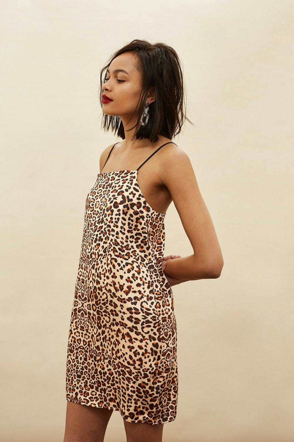 leopard print dress with black top underneath