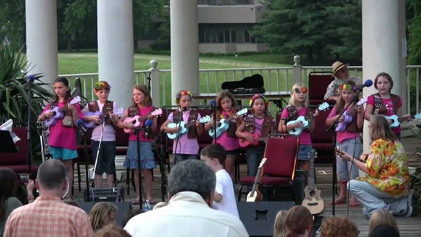 Girl Scouts perform in front of the audience