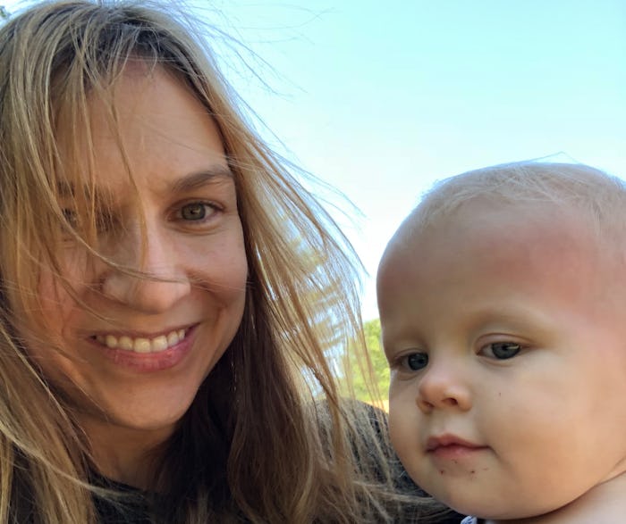 Emily Foster, who is determined never to look like 'that mom', smiling next to her toddler in a self...