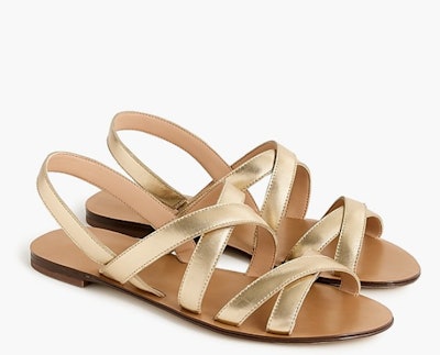 Cross-strap sandals in metallic gold leather 