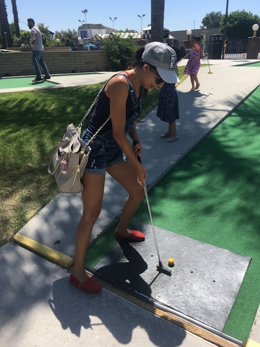 Ambrosia Brody playing mini golf