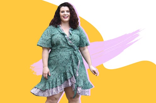 An plus sized model posing in a green plus size dress