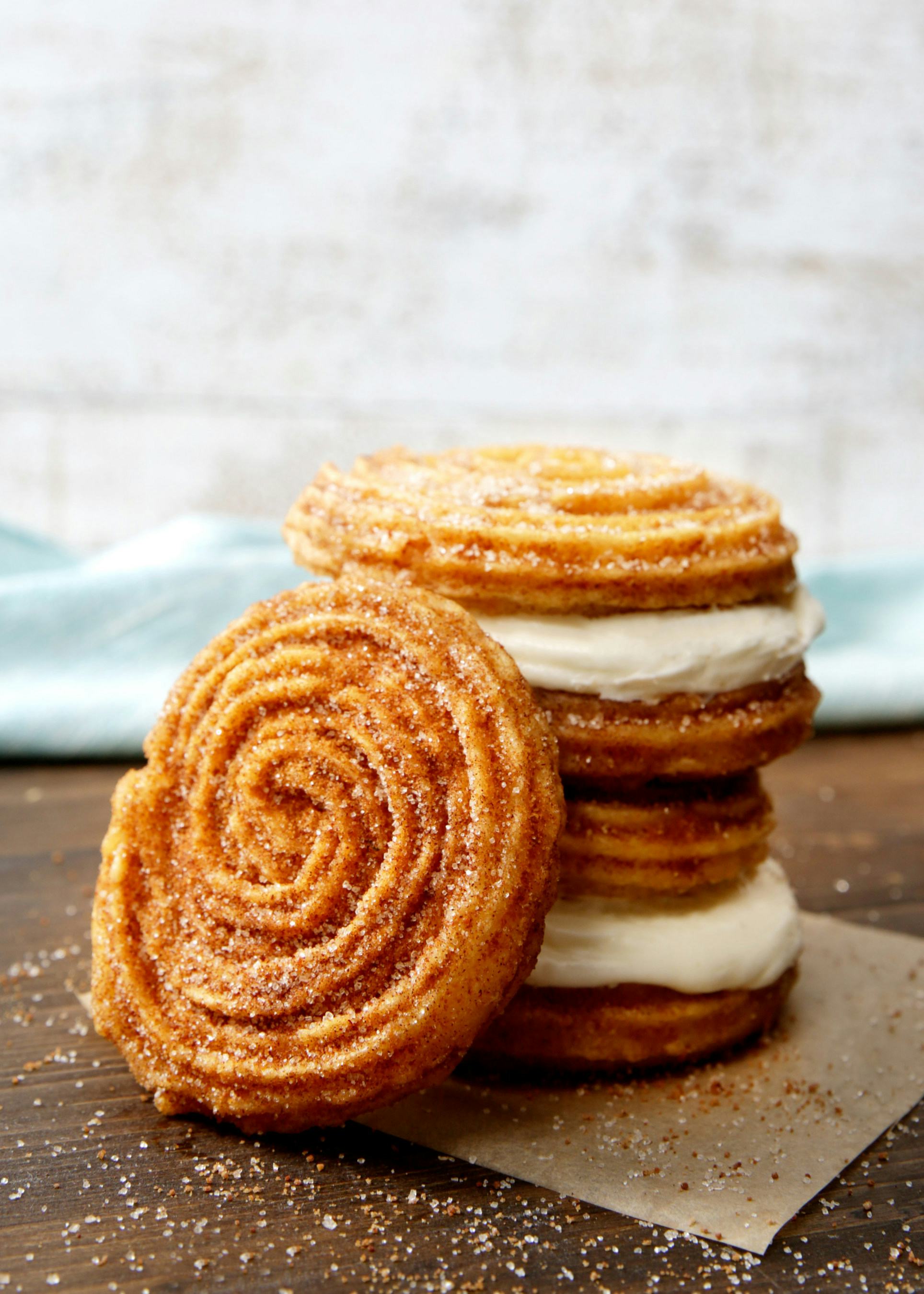 Cinnabon's New Churro Swirls Launched With A Churro Frosting Sandwich