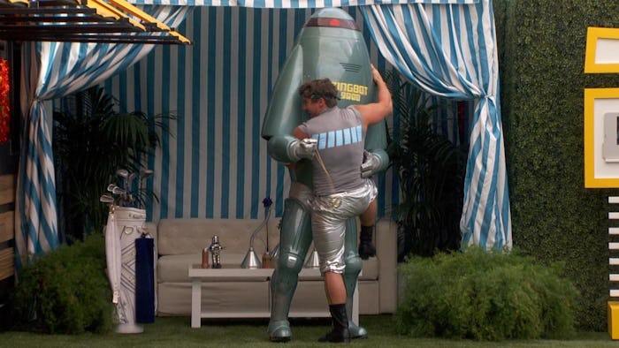 Brett from Big Brother hugging a robot mascot