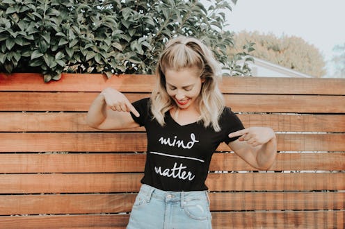 The writer points to her tshirt with the slogan "mind over matter." Here's what one writer did after...