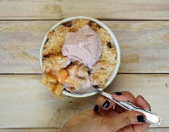 Vegan Apple Cobbler served in a cup with a spoon