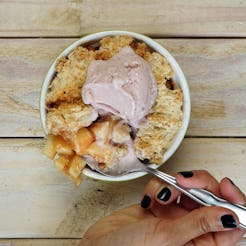 Vegan Apple Cobbler served in a cup with a spoon