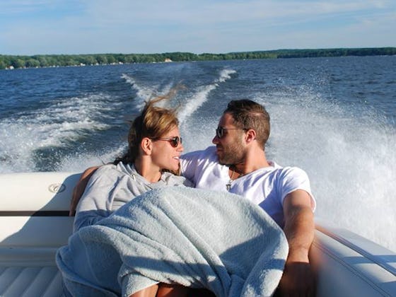 A woman on a boat with her partner