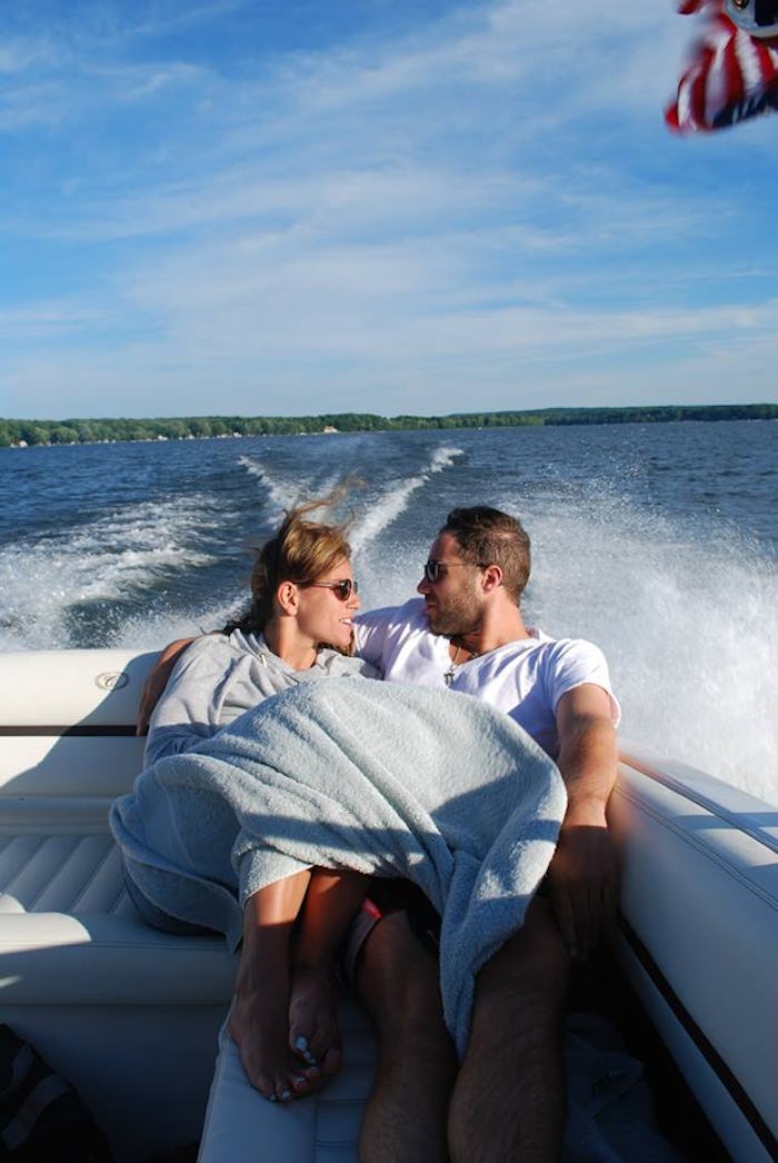 A woman on a boat with her partner