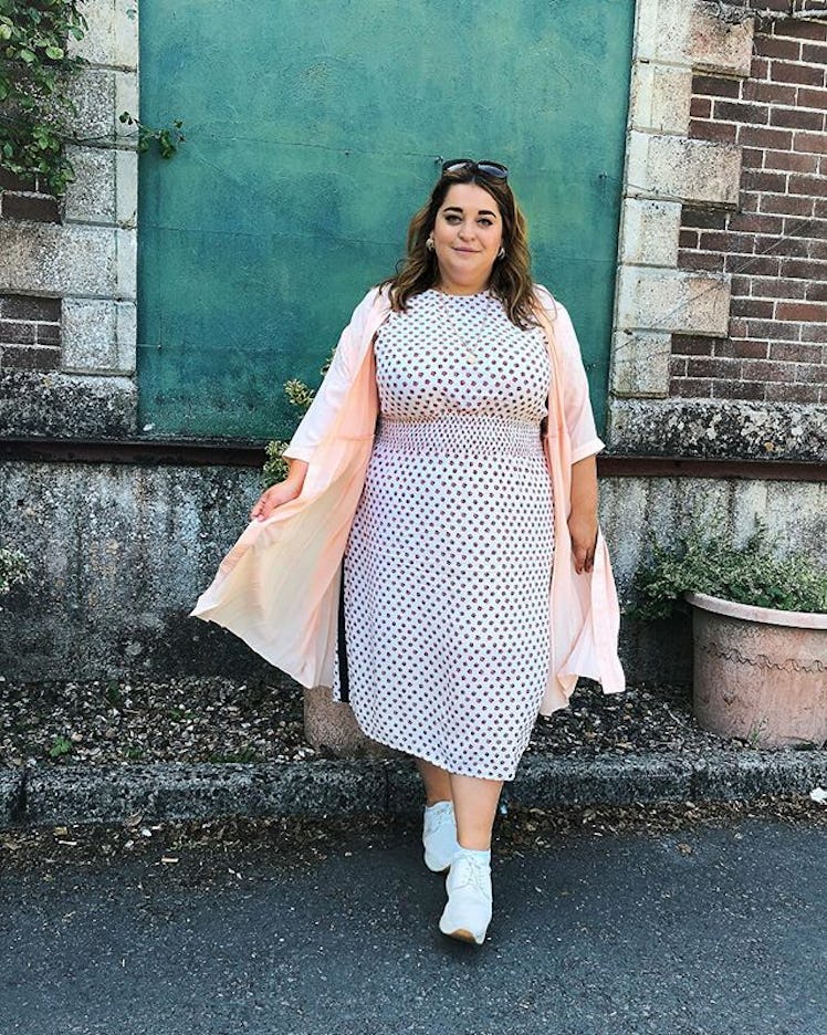 Plus-Size Influencer Danielle Vanier wearing a polka dot dress.