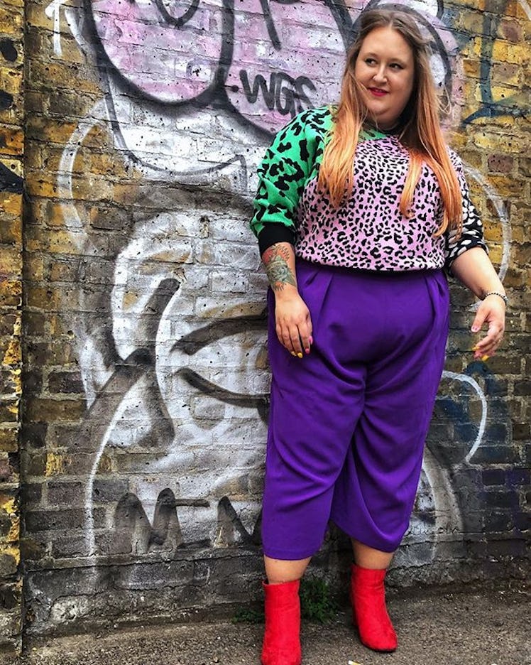 Plus-Size Influencer Lottie L'amour wearing animal print sweatshirt with lilac pants. 