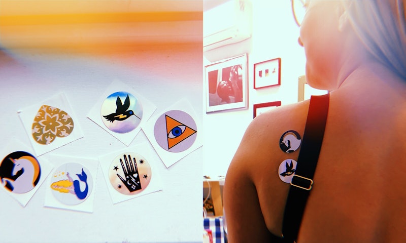 A woman wearing body vibes patches on her back