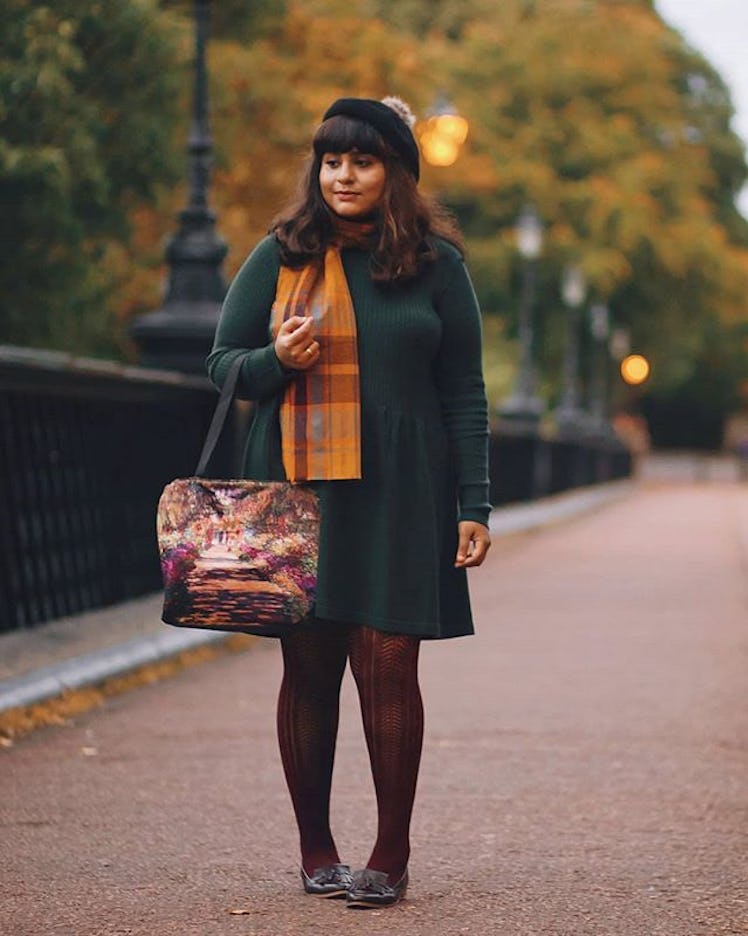 Plus-Size Influencer Ragini Nag Rao posing in Irish green dress with mustard scarf.