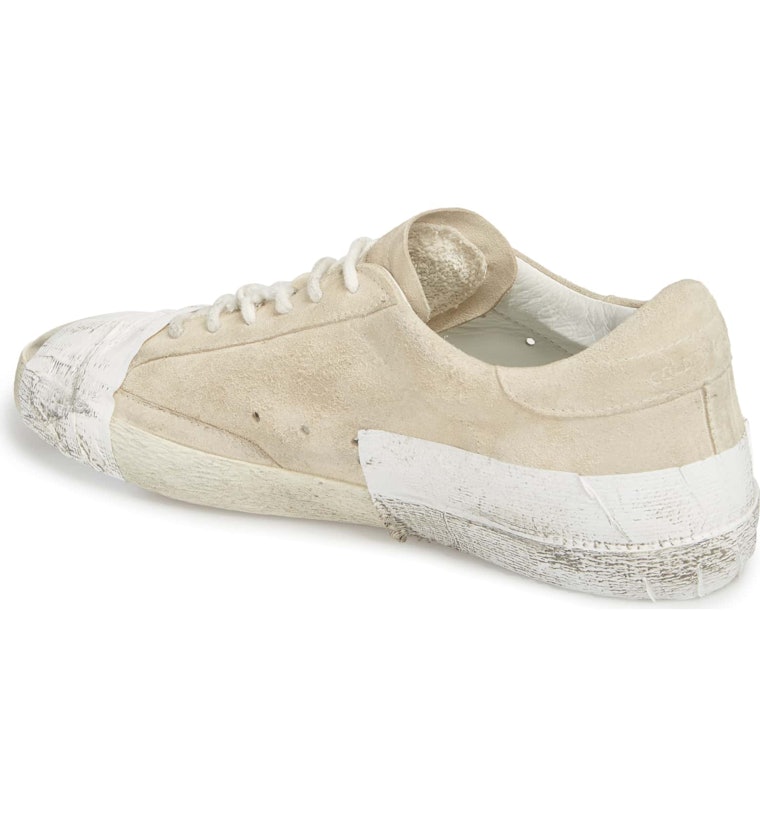 Golden Goose's Beat Up, Taped Sneakers Have The Internet Freaking Out