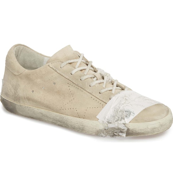 Golden Goose's Beat Up, Taped Sneakers Have The Internet Freaking Out