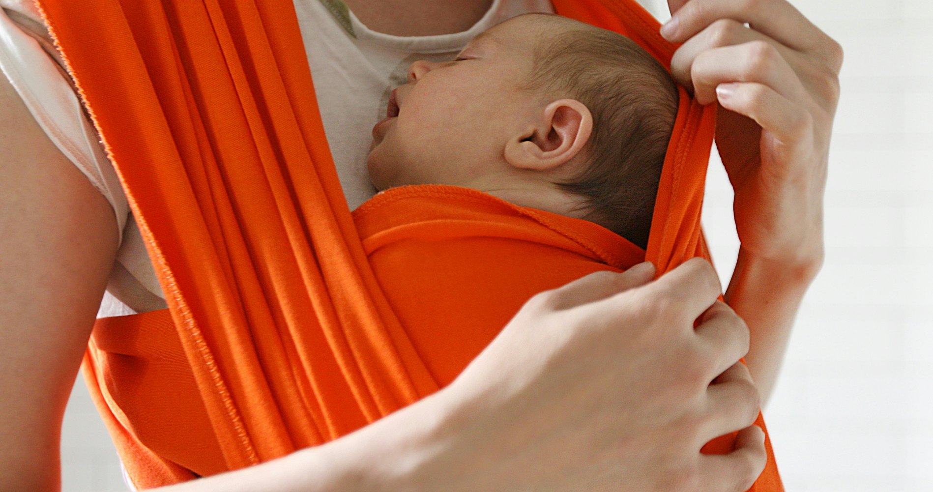 Sleeping with baby sales in sling