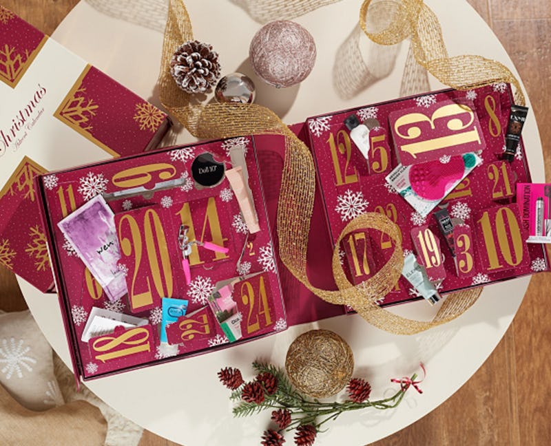 What S In Qvc S Beauty Advent Calendar There S 285 Worth Of Primo Product For Less Than 70 Qvc Beauty Advent Calendar