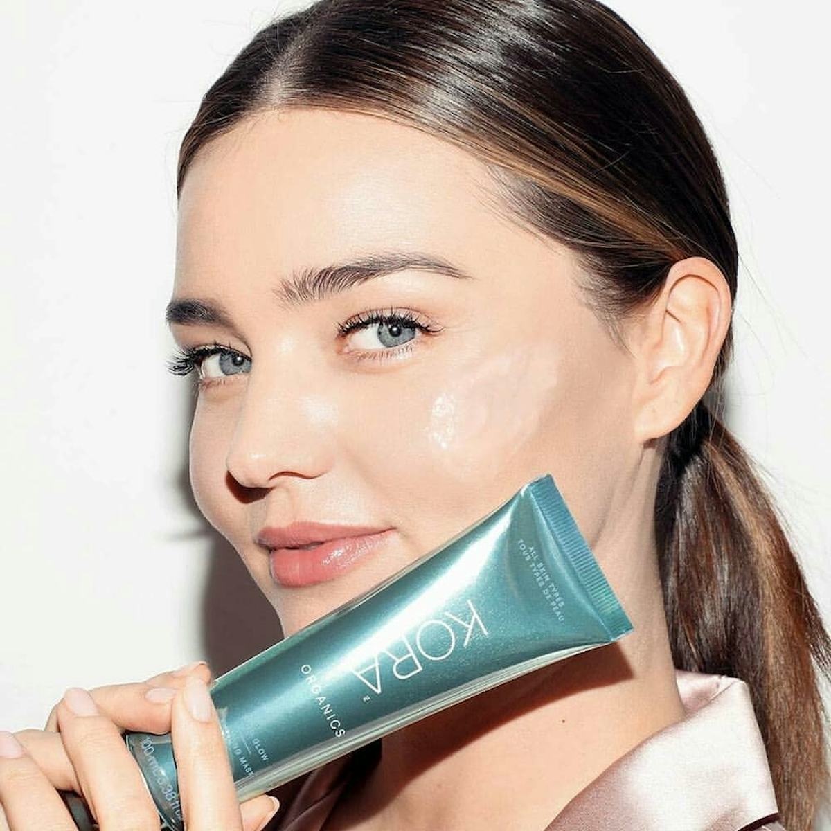 How to use a sleeping mask: Miranda Kerr uses her KORA Organics mask.