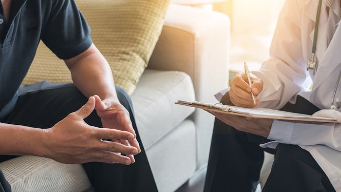 A man during a screening test with a doctor with could prevent miscarriages