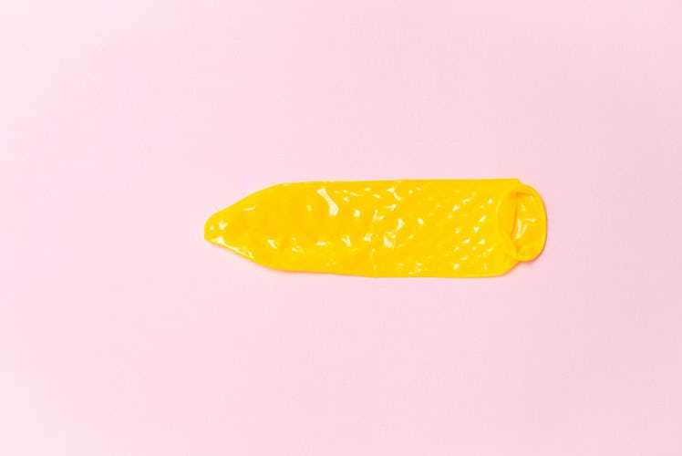 Stretched out yellow condom