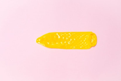 Stretched out yellow condom